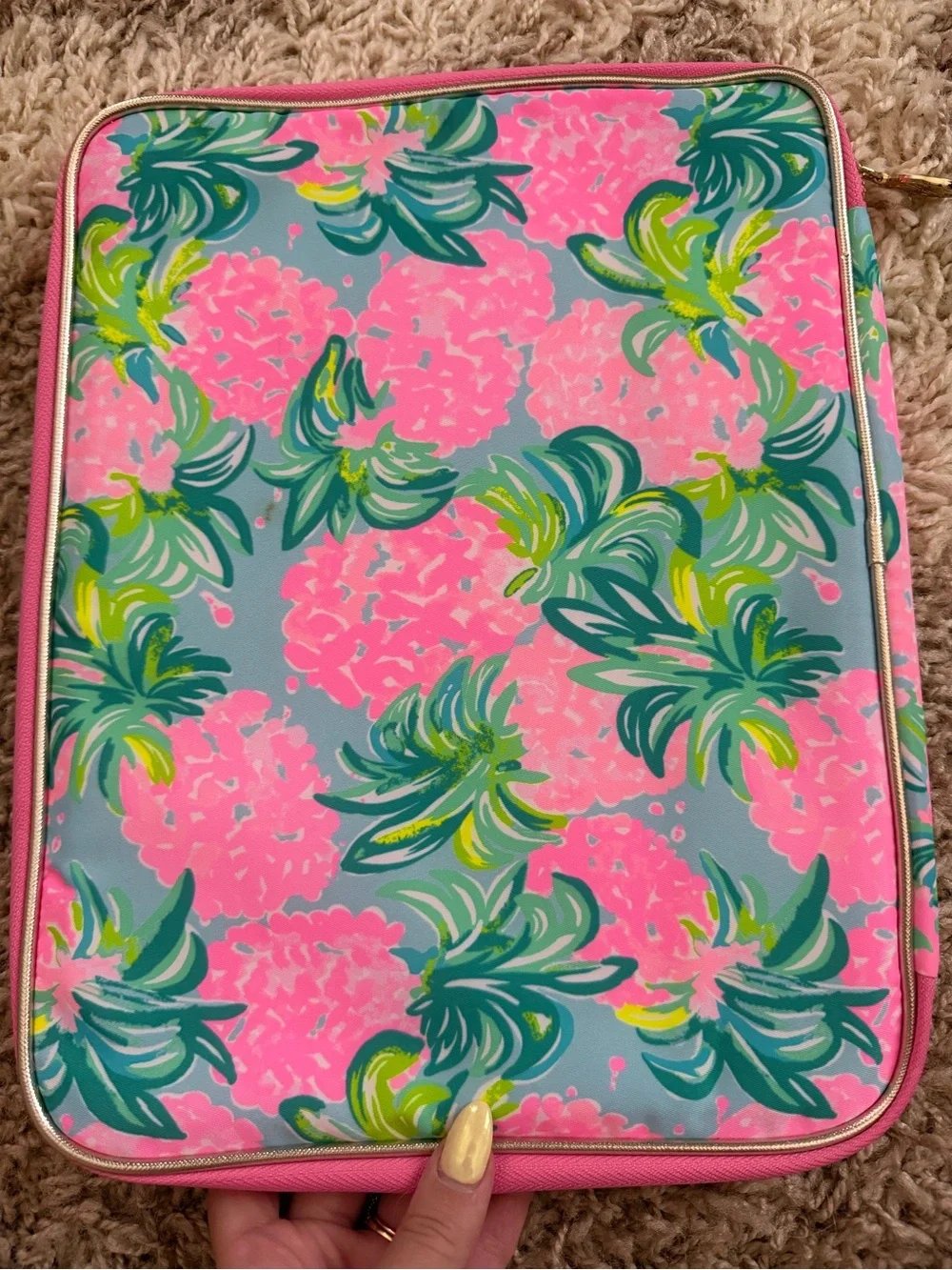 Women's floral pouch with brand plaque